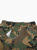 Trendy camouflage ripped harem pants for women, worn and loose, street style hanging crotch pants