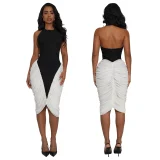 Fashionable women's dress with a hanging neck, exposed back, and folded buttocks