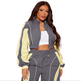 Casual color blocking splicing, zip up waist, zipper top, straight leg pants, pull rope two-piece set
