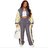 Casual color blocking splicing, zip up waist, zipper top, straight leg pants, pull rope two-piece set