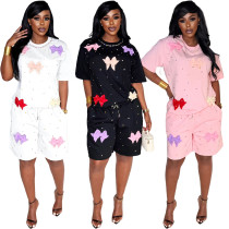 Butterfly knot splicing short sleeved round neck T-shirt+heavy-duty diamond studded shorts two-piece set