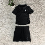 Two piece top with distinctive short skirts on both sides, drawstring and logo