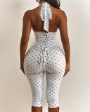 Hanging neck polka dot fishbone waist zipper seven piece jumpsuit (fake two pieces)