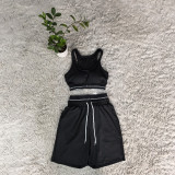 Fashionable cropped tank top with double waistbands and seven-inch yoga pants casual workout set (includes chest pad)