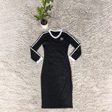 Slimming and slimming V-neck embroidered long sleeved dress with sexy slit and hip hugging mid length skirt