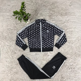Women's polka dot stand up collar zipper jacket, leg binding pants, casual sports suit