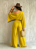 Fashionable and sexy seaside vacation solid color sloping shoulder collar irregular off shoulder top elastic waist pocket pants