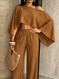 Fashionable and sexy seaside vacation solid color sloping shoulder collar irregular off shoulder top elastic waist pocket pants