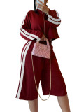 Stand up zipper jacket with contrasting stripes on the sides, two piece set of seven inch wide leg pants