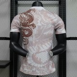 2024-25 Real Madrid white and brown dragon jersey
