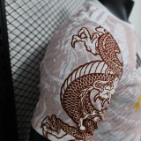 2024-25 Real Madrid white and brown dragon jersey