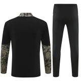 PSV half-zip black suit