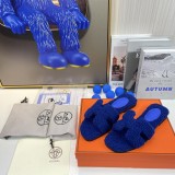 Hermès teddy fur slippers