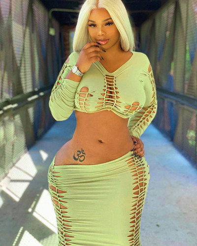 Fashionable and Sexy Hollow Long Sleeve Top Slim Fit Skirt Set