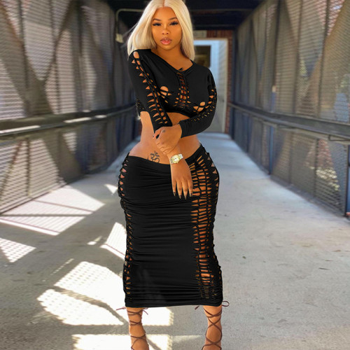 Fashionable and Sexy Hollow Long Sleeve Top Slim Fit Skirt Set