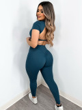 Solid color short-sleeved backless yoga shirt tight trousers sports yoga wear