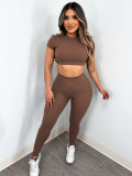 Solid color short-sleeved backless yoga shirt tight trousers sports yoga wear