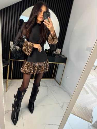Leopard print paneled trumpet sleeve mini dress