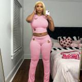 Fashion women's solid color heart hollow out sleeveless top and trousers set
