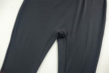 Women's solid color slim fit metal ring one shoulder jumpsuit