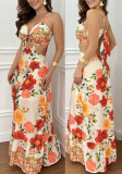 Summer women's floral print lace-up hollow holiday dress