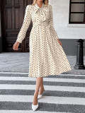Retro-style gentle midi-length polka dot dress