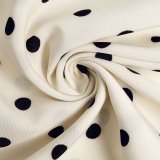 Retro-style gentle midi-length polka dot dress
