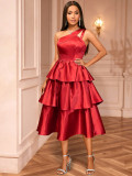 One-shoulder ruffled hem cinched waist A-line silhouette tie-waist party evening gown