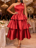 One-shoulder ruffled hem cinched waist A-line silhouette tie-waist party evening gown