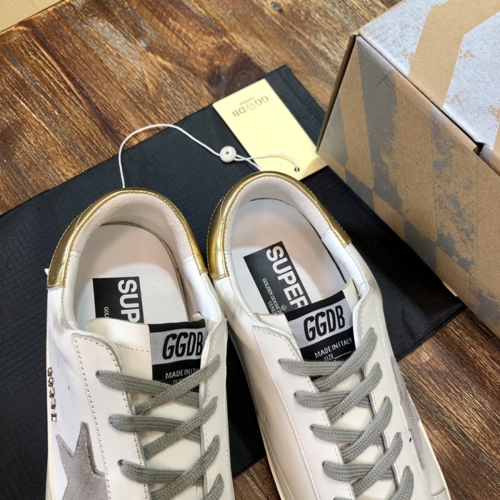 Golden Goose Superstar distressed-finish sneakers 13