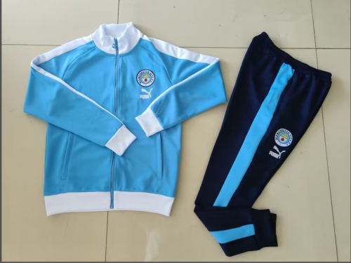 2023-2024 Manchester City Blue Soccer Jacket and Black Pants