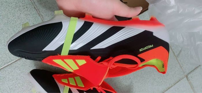 1:1 Quality Black/Orange Soccer Shoes