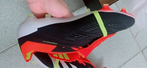 1:1 Quality Black/Orange Soccer Shoes