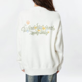 Katie Ermilio White cute style sweater
