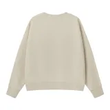 Katie Ermilio  A turtleneck Apricot