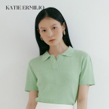 Katie Ermilio green polo shirt