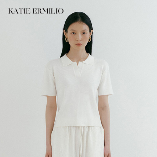 Katie Ermilio white cropped top