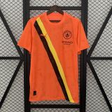 Manchester City 25/26 away orange jersey kit shirt
