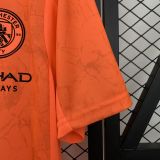 Manchester City 25/26 away orange jersey kit shirt