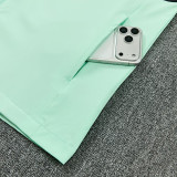 26/27 France Light Green Hooded Windbreaker Tracksuit