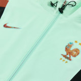 26/27 France Light Green Hooded Windbreaker Tracksuit