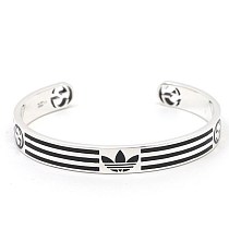 定番 グッチ●adidas x グッチ カフブレスレットコピー 702869 J8410 8163 定番 グッチ●adidas x グッチ カフブレスレットコピー 702869 J8410 8163