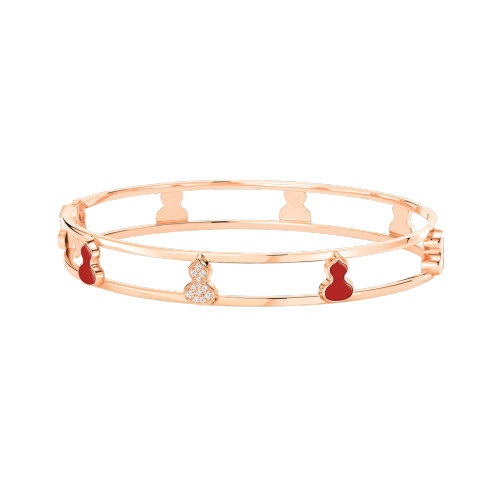 Qeelin Wulu bangle in 18K rose gold with diamonds and red agate