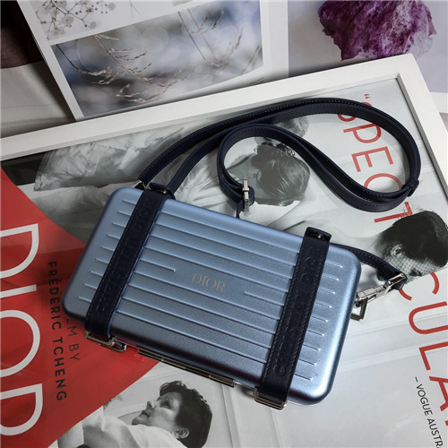 dior and rimowa personal clutch