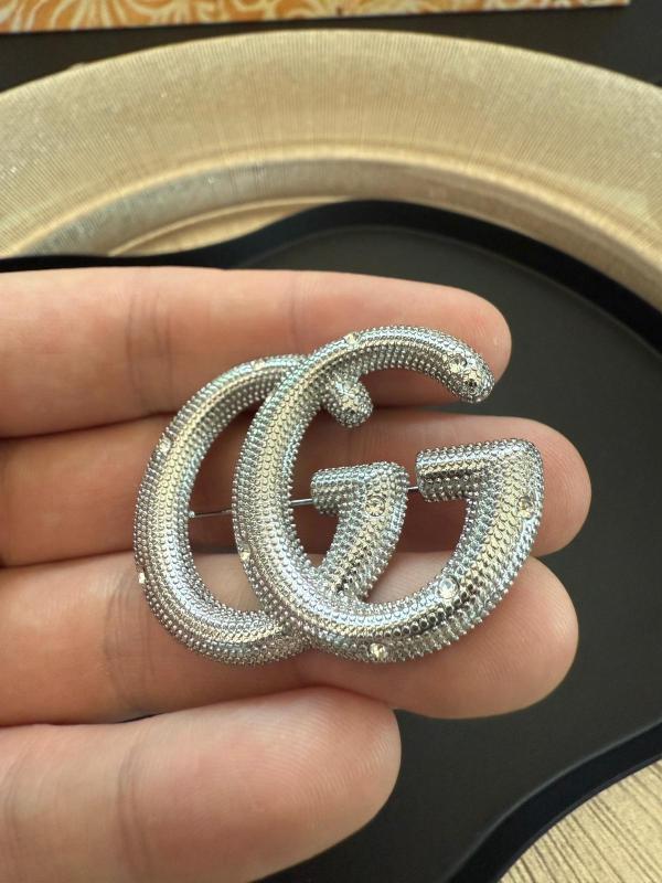 Spilla Gucci