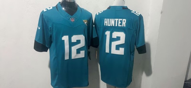 Jacksonville Jaguars 12 Travis Hunter Football Jersey Green Three Dynasties