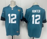 Jacksonville Jaguars 12 Travis Hunter Football Jersey Legend Green