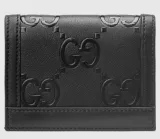 SALE★GG Deboss柄【送込GUCCI】2折中財布★黒白革/金デコ-BUYMA
