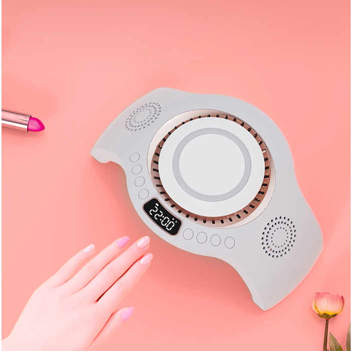 M10  5 in 1 Wireless charger with Bluetooth speaker, UV Nail lights, Clock