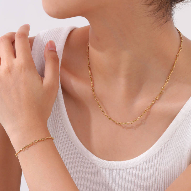 Wholesale Stainless Steel Gold Twisted Bracelet and Necklace Set